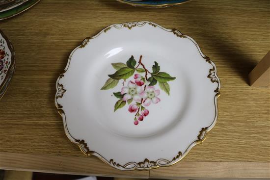 A small collection of decorative floral painted dessert dishes